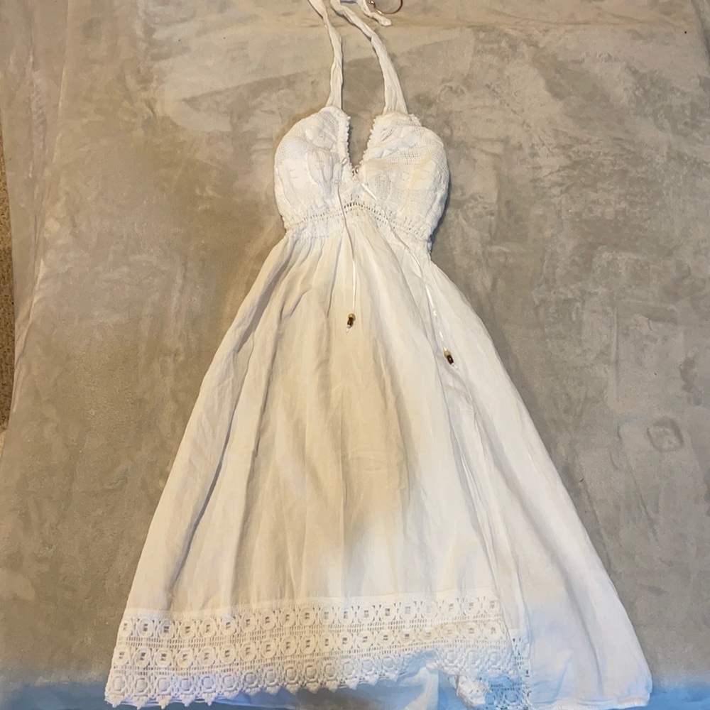 White sun dress with embroidered detail